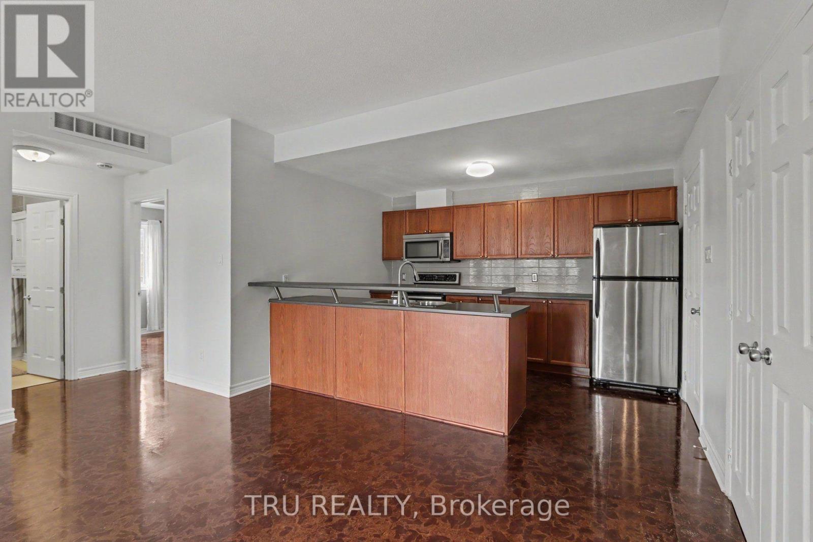 7 - 165 WATERBRIDGE DRIVE