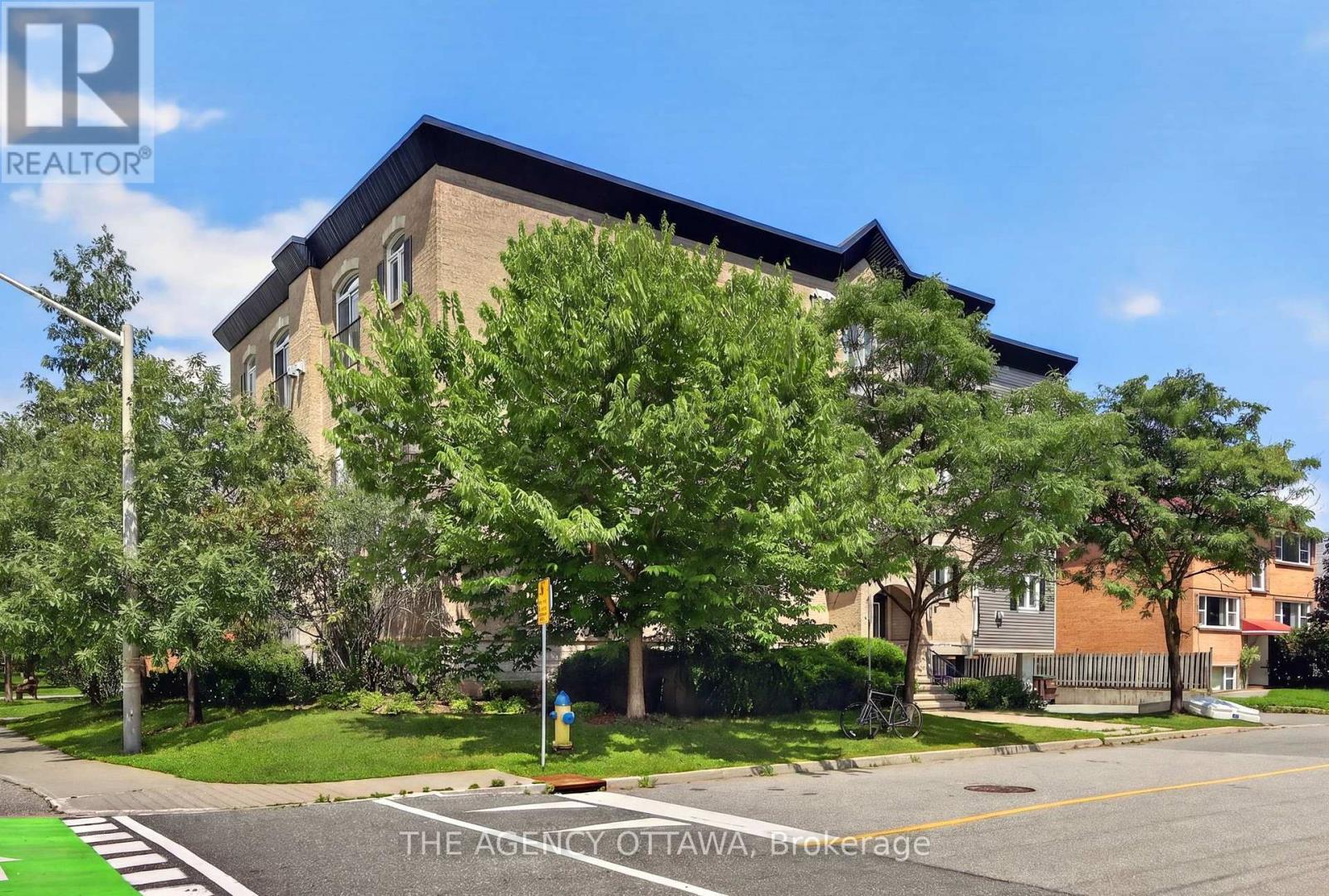203 - 711 CHURCHILL AVENUE N