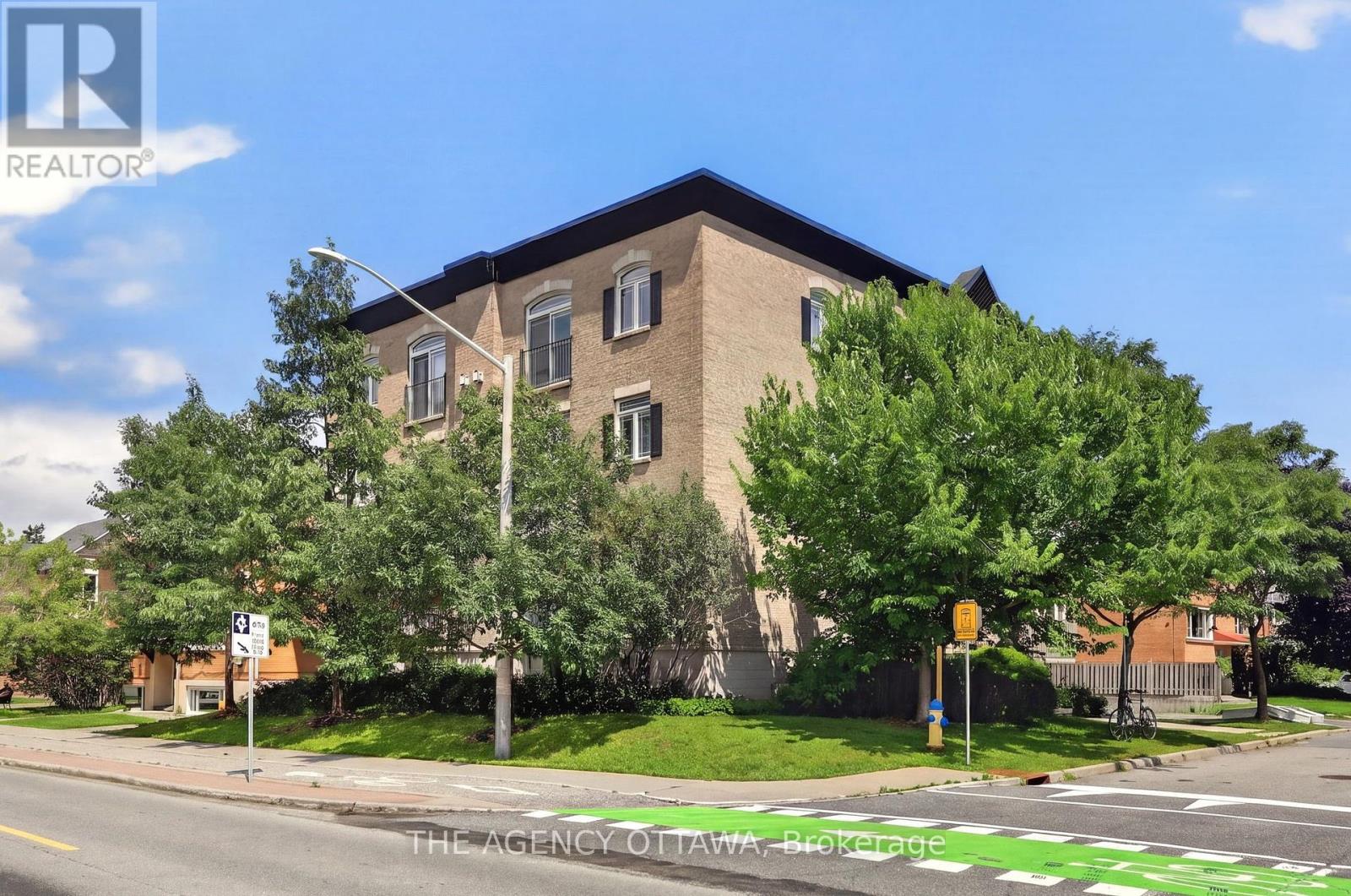 203 - 711 CHURCHILL AVENUE N