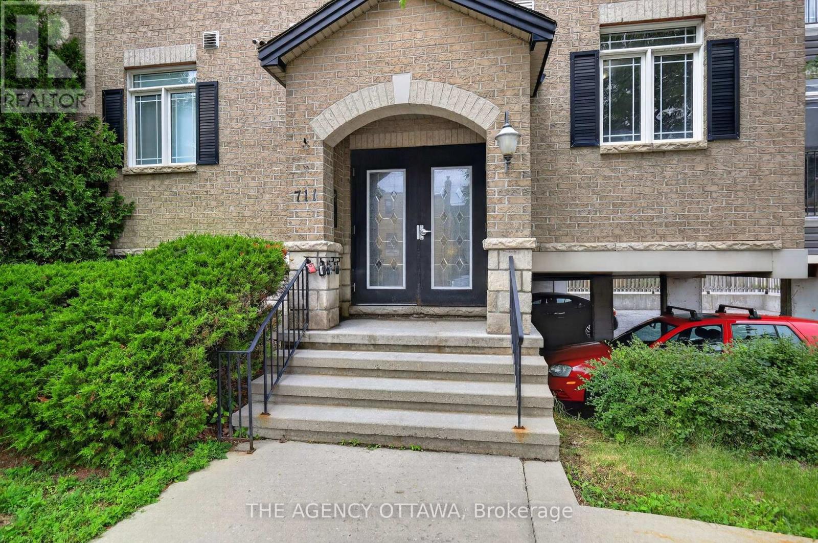 203 - 711 CHURCHILL AVENUE N