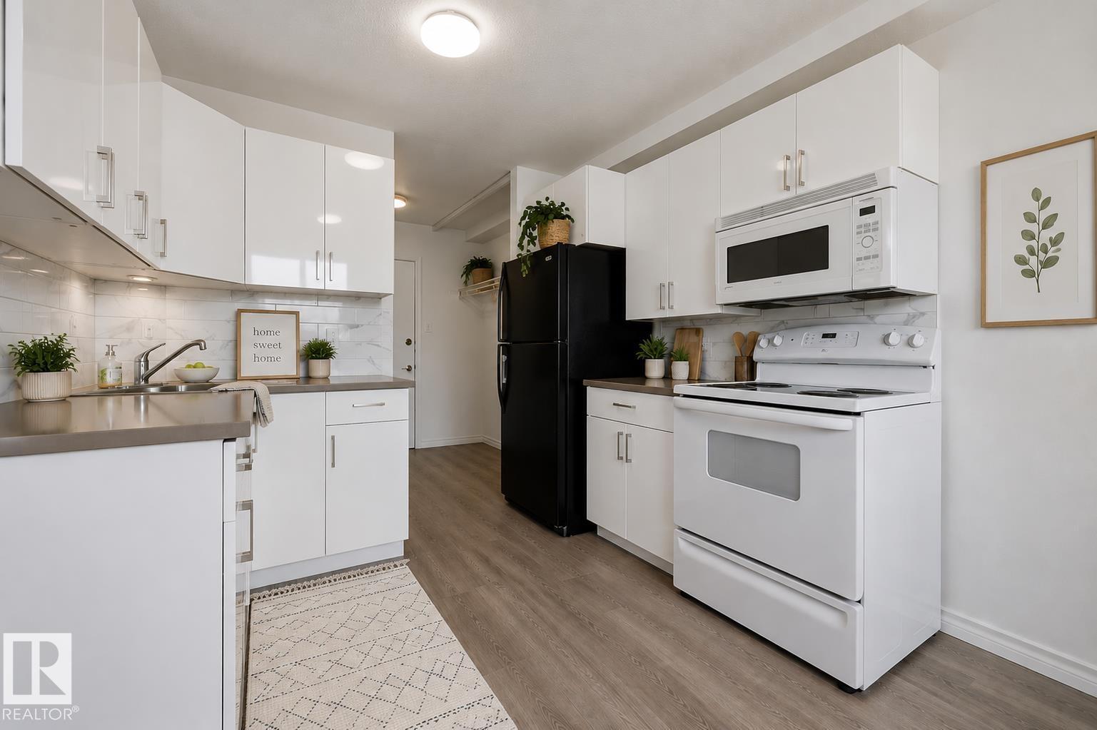 #105 14530 52 ST NW