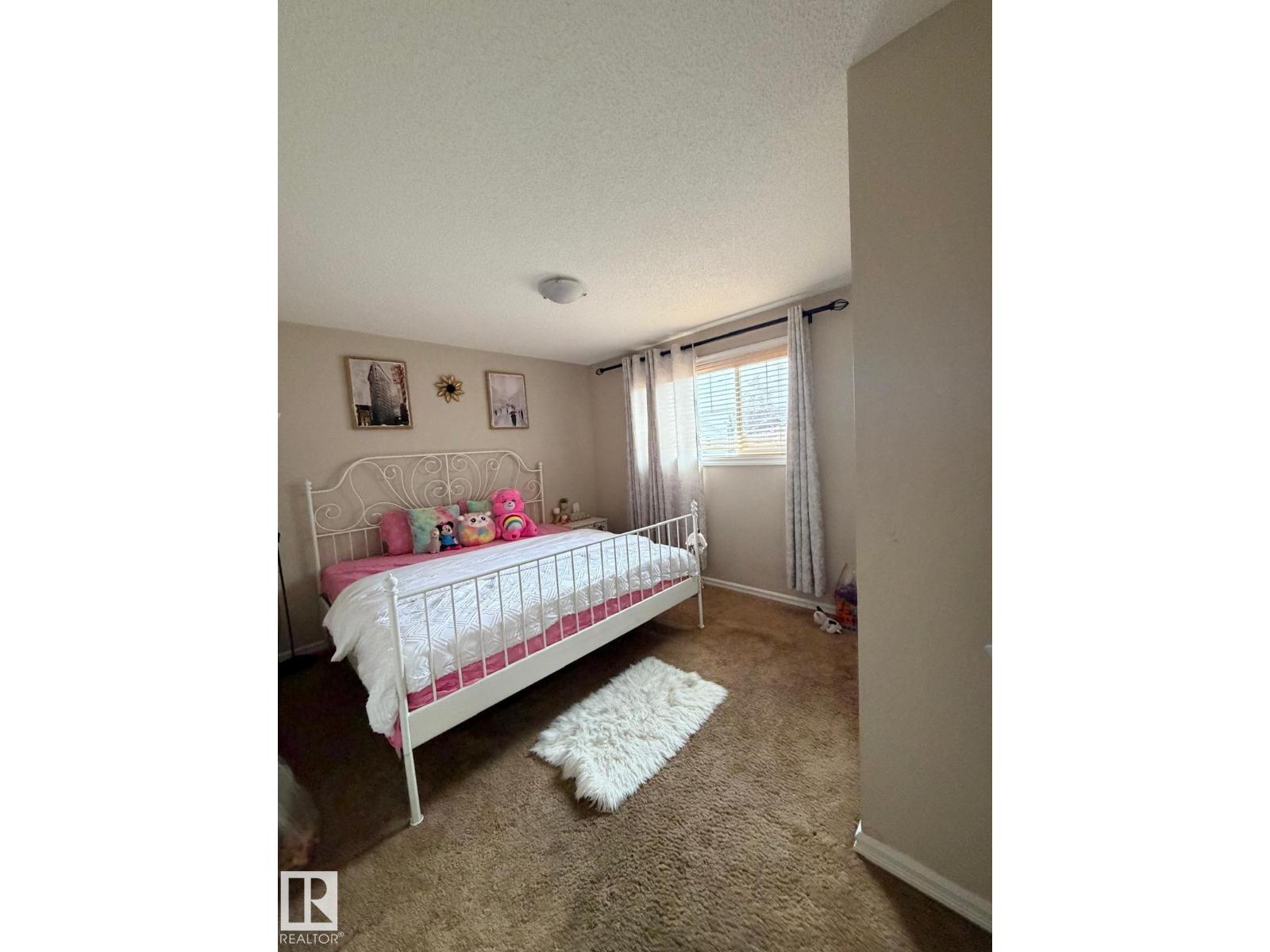 8715 11 AV SW