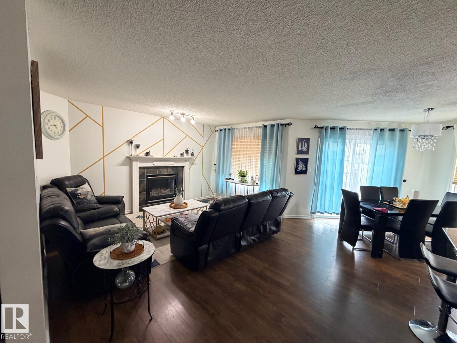 8715 11 AV SW