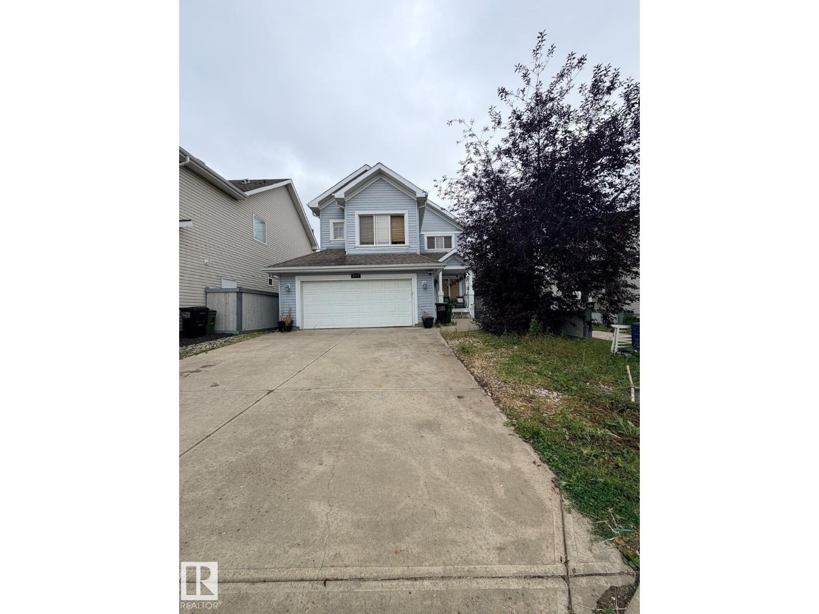 8715 11 AV SW