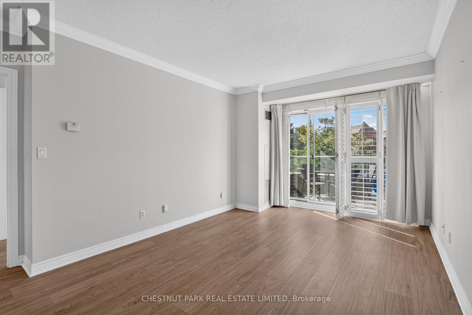 205 - 100 PROMENADE CIRCLE