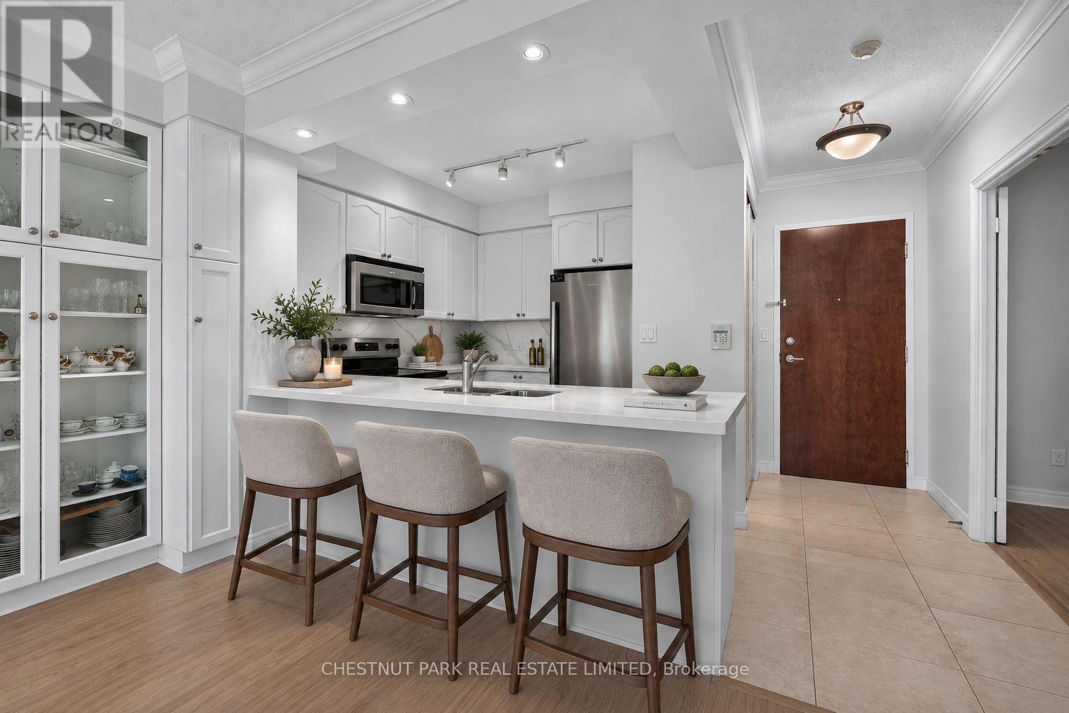 205 - 100 PROMENADE CIRCLE