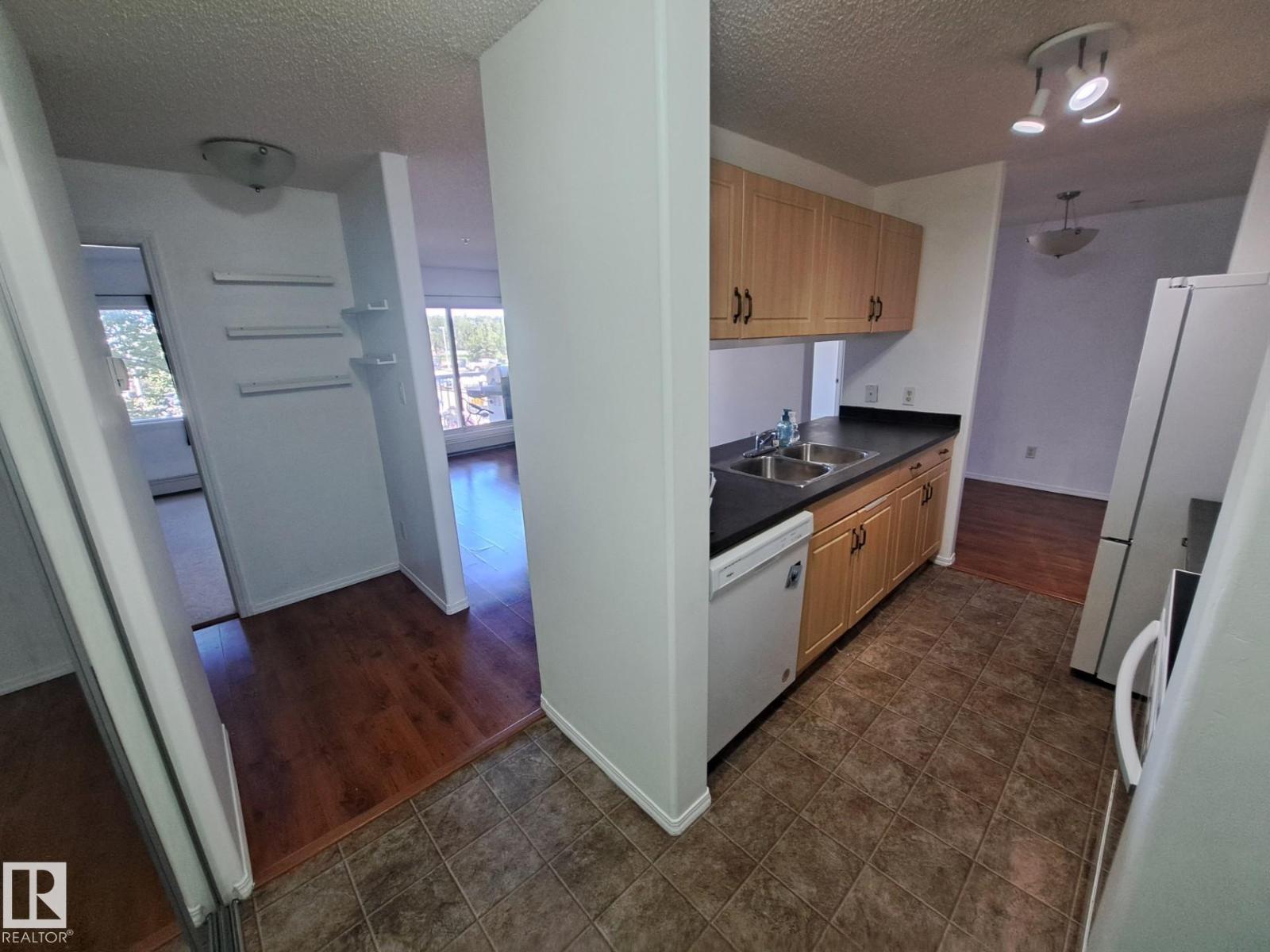 #205 9910 107 ST