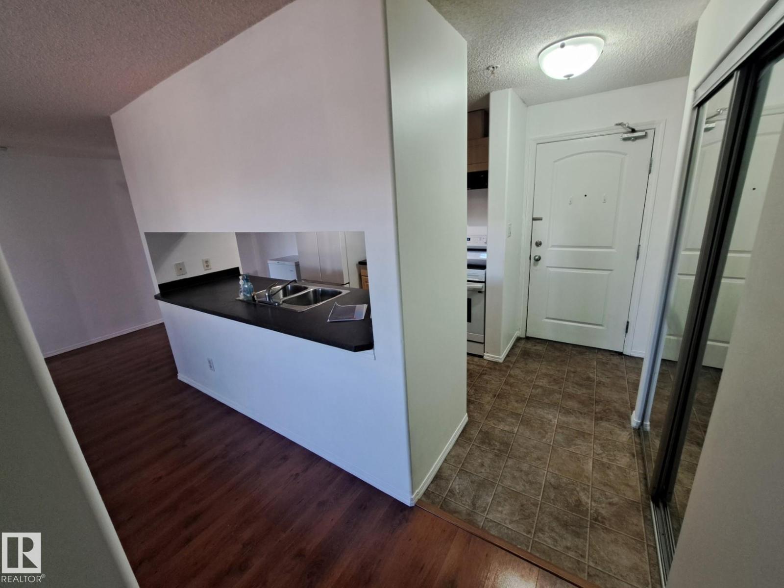 #205 9910 107 ST