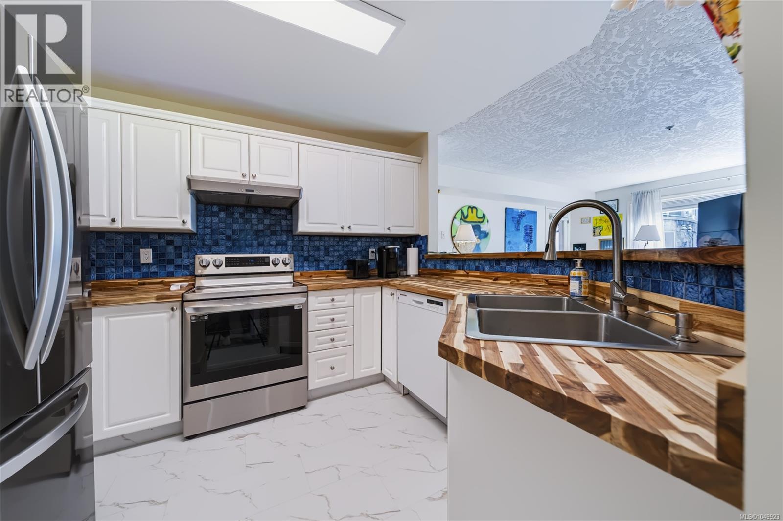 212 4965 Vista View Cres