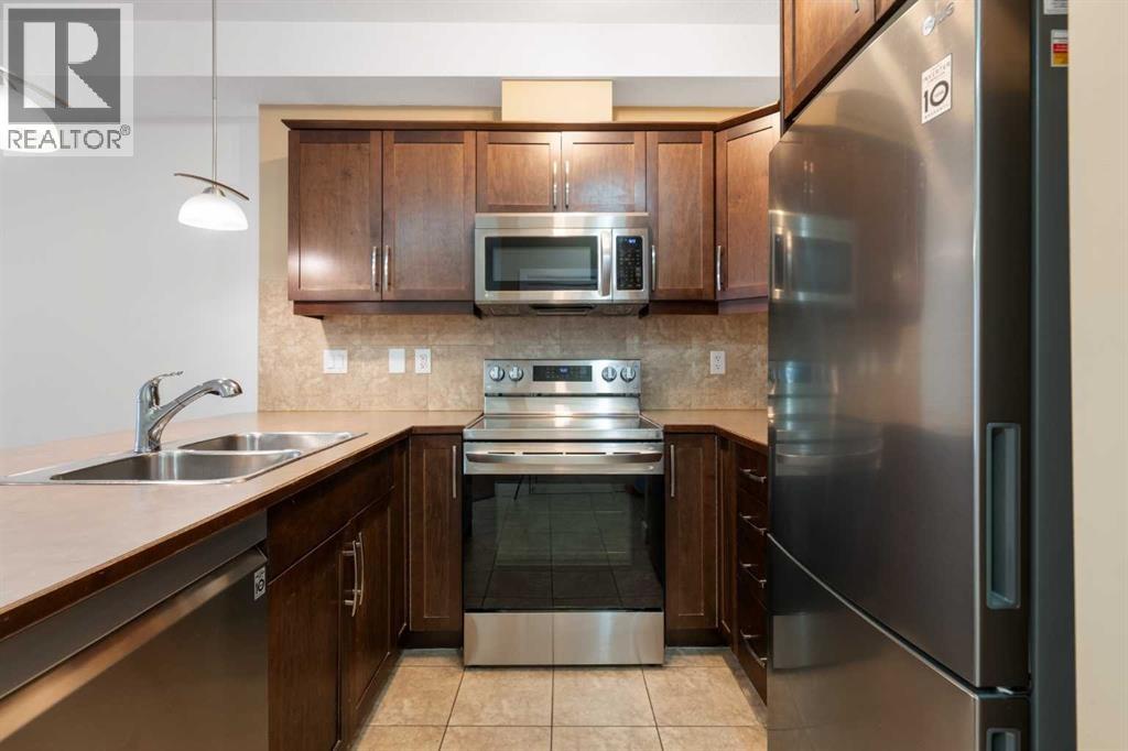 210, 15304 Bannister Road SE