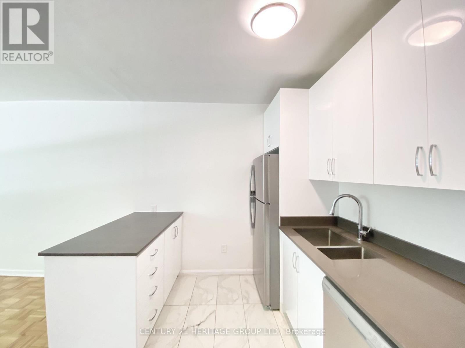 102 - 3111 EGLINTON AVENUE E