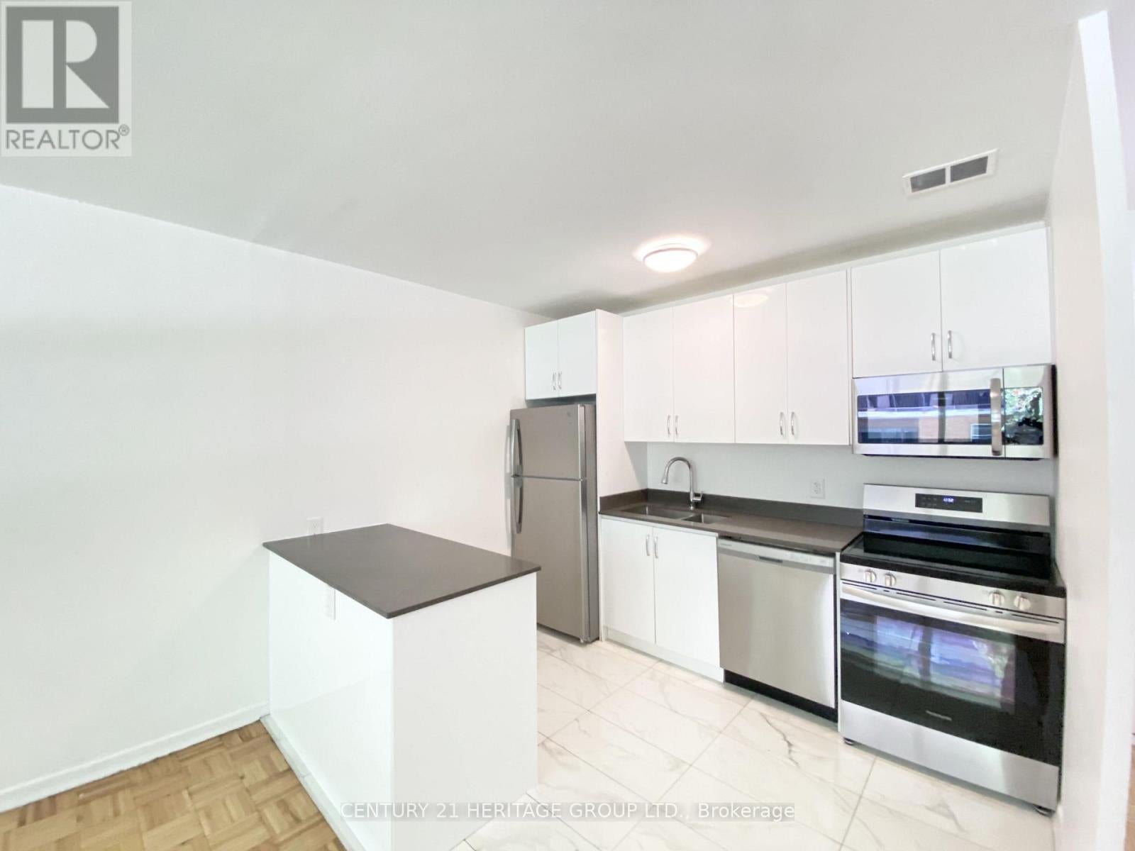 102 - 3111 EGLINTON AVENUE E