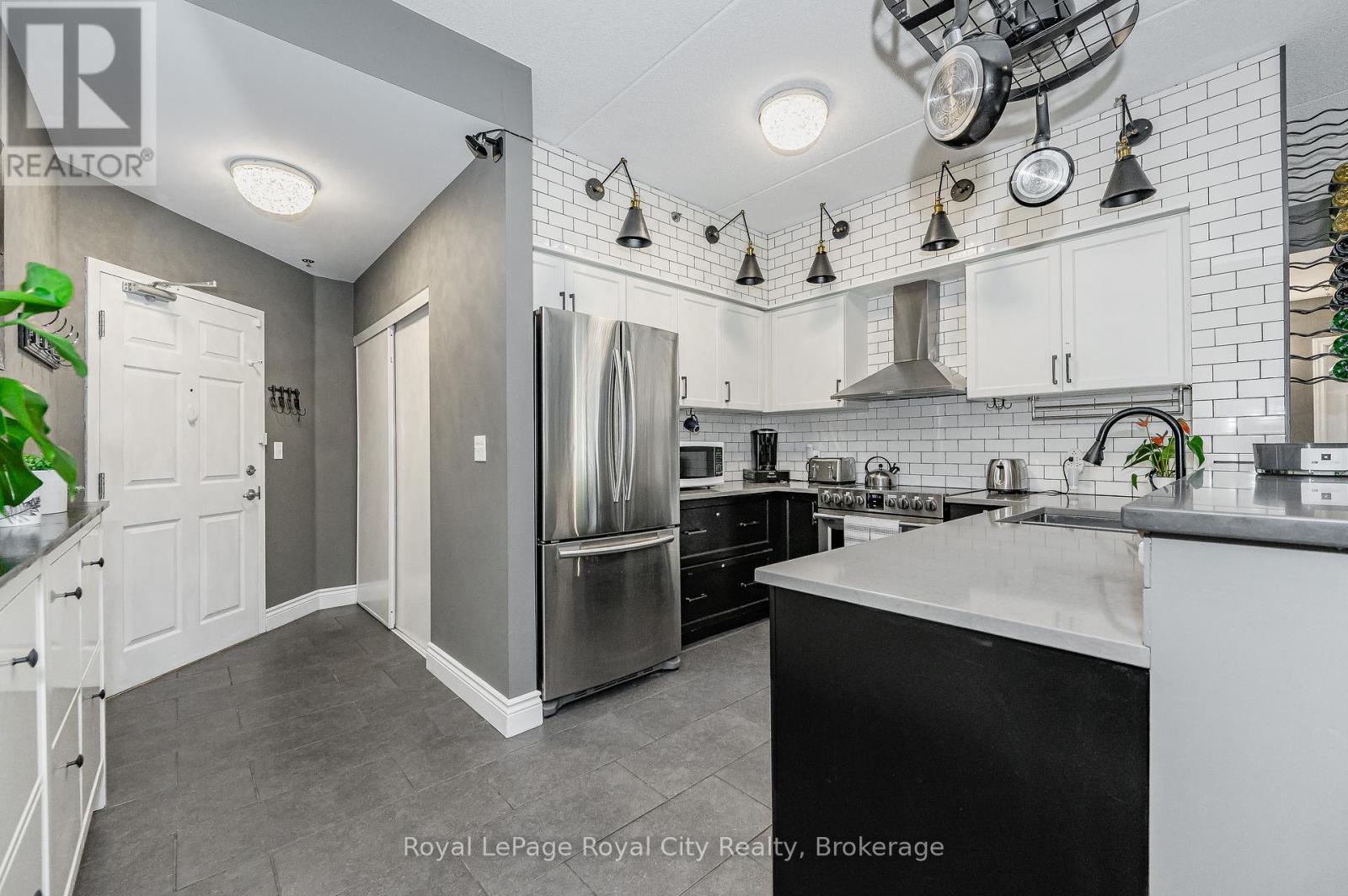 102 - 308 WATSON PARKWAY N