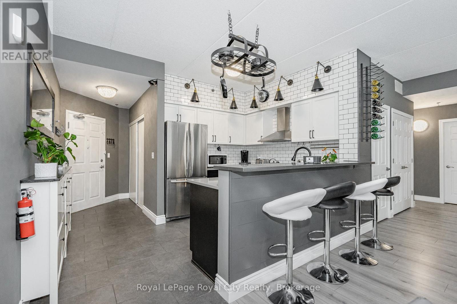 102 - 308 WATSON PARKWAY N