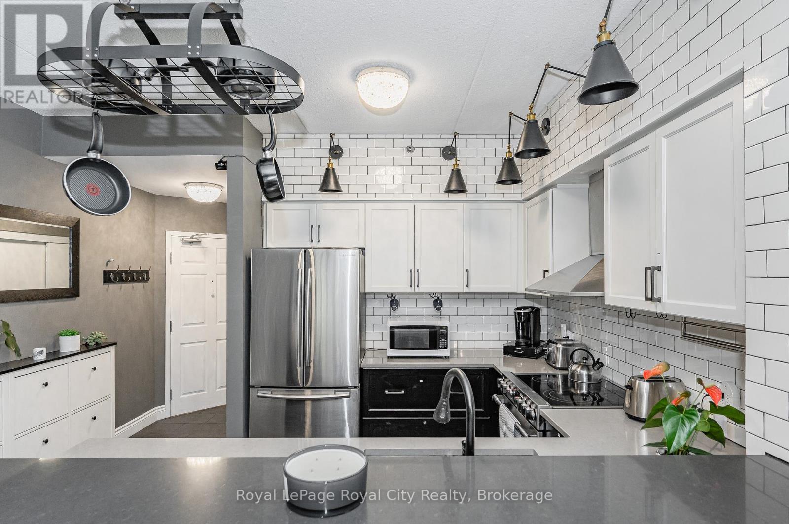 102 - 308 WATSON PARKWAY N