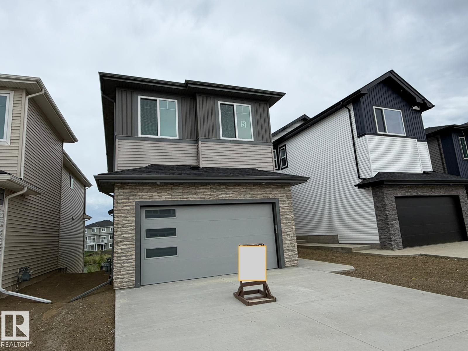 5 AXELWOOD CR