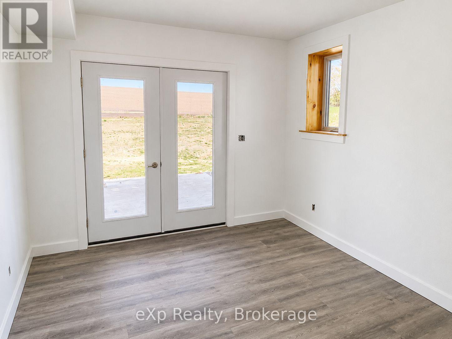 LOWER LEVEL UNIT - 272 12 CONCESSION