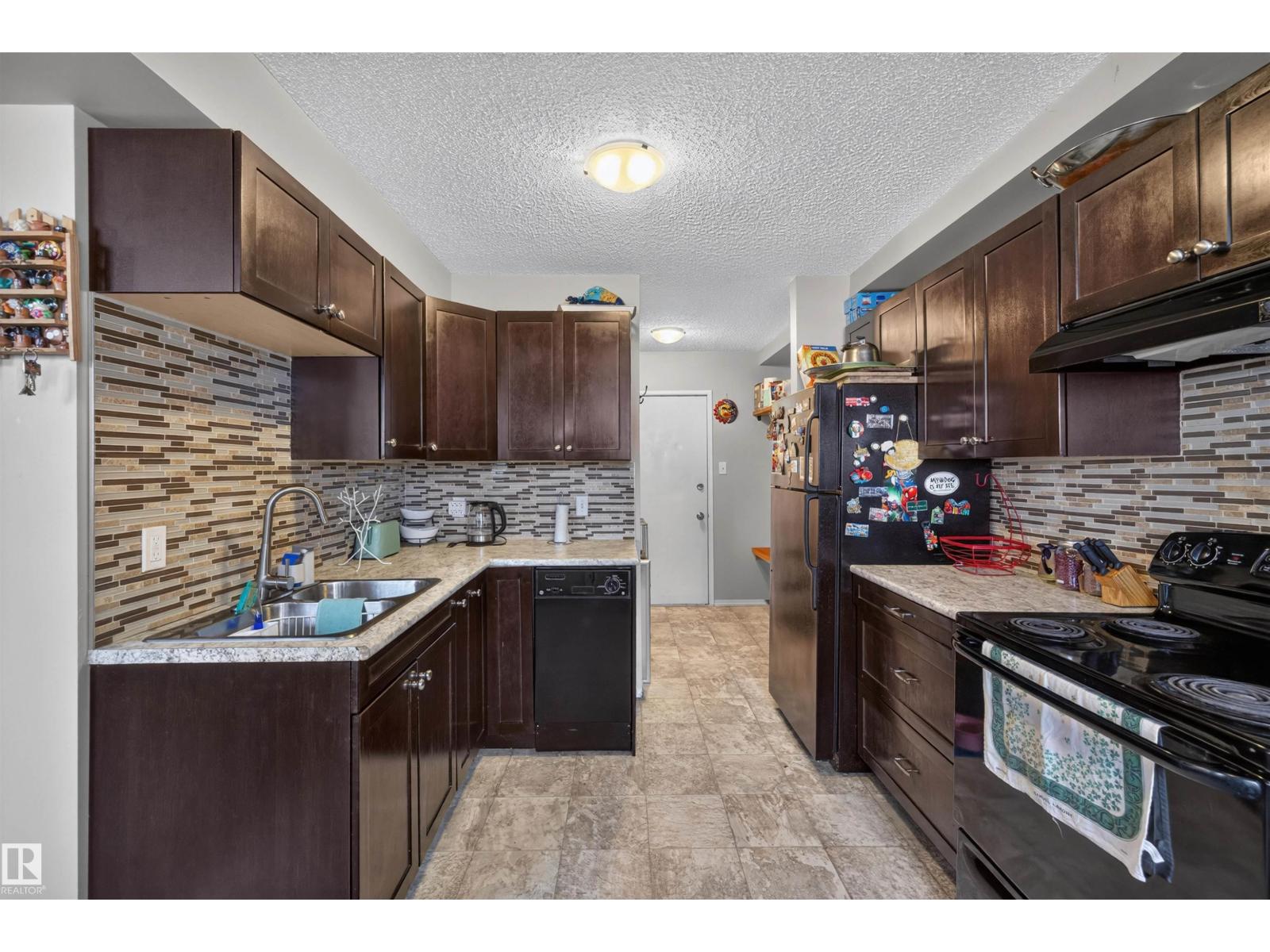 #102 14520 52 ST NW