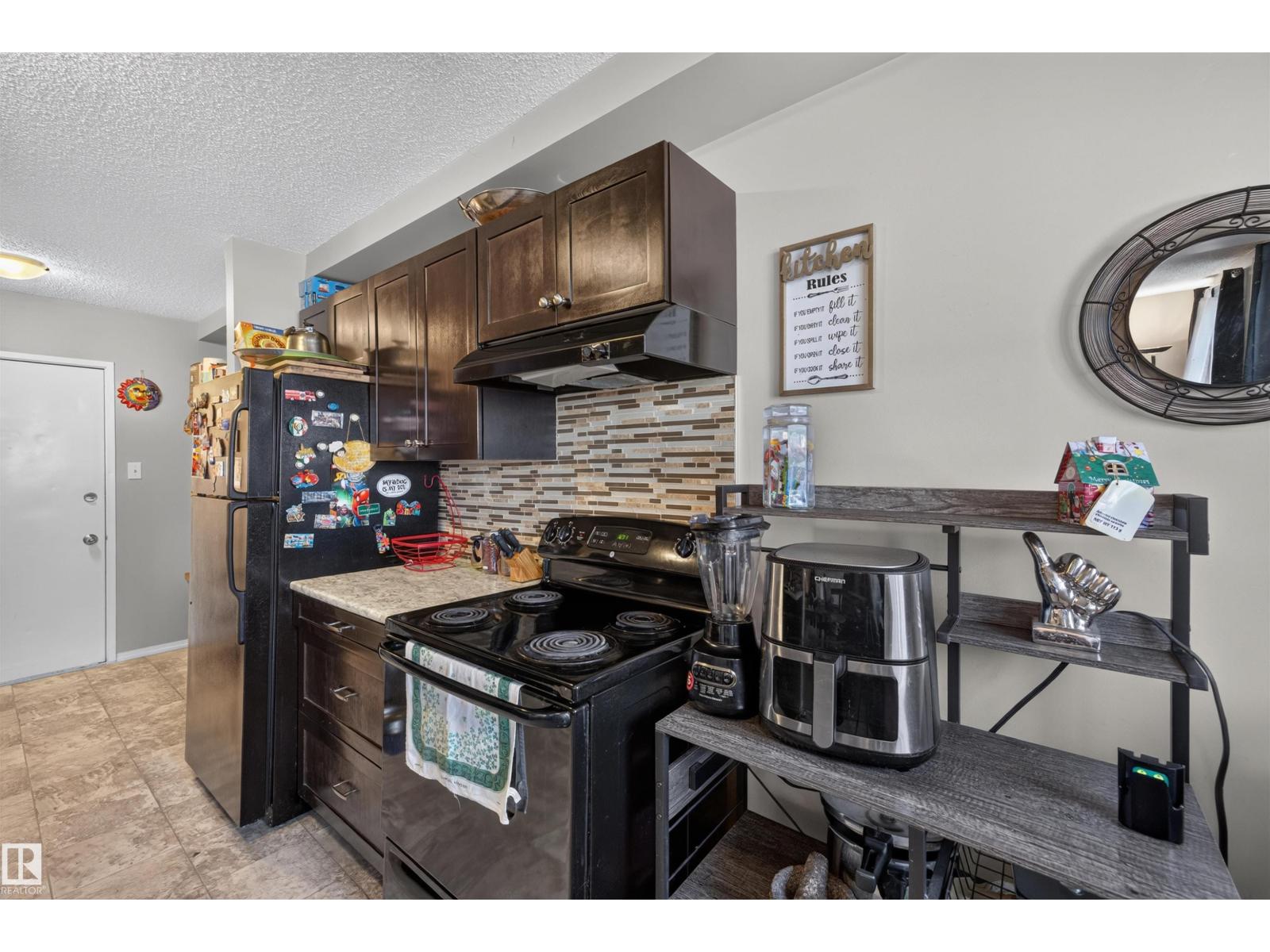 #102 14520 52 ST NW