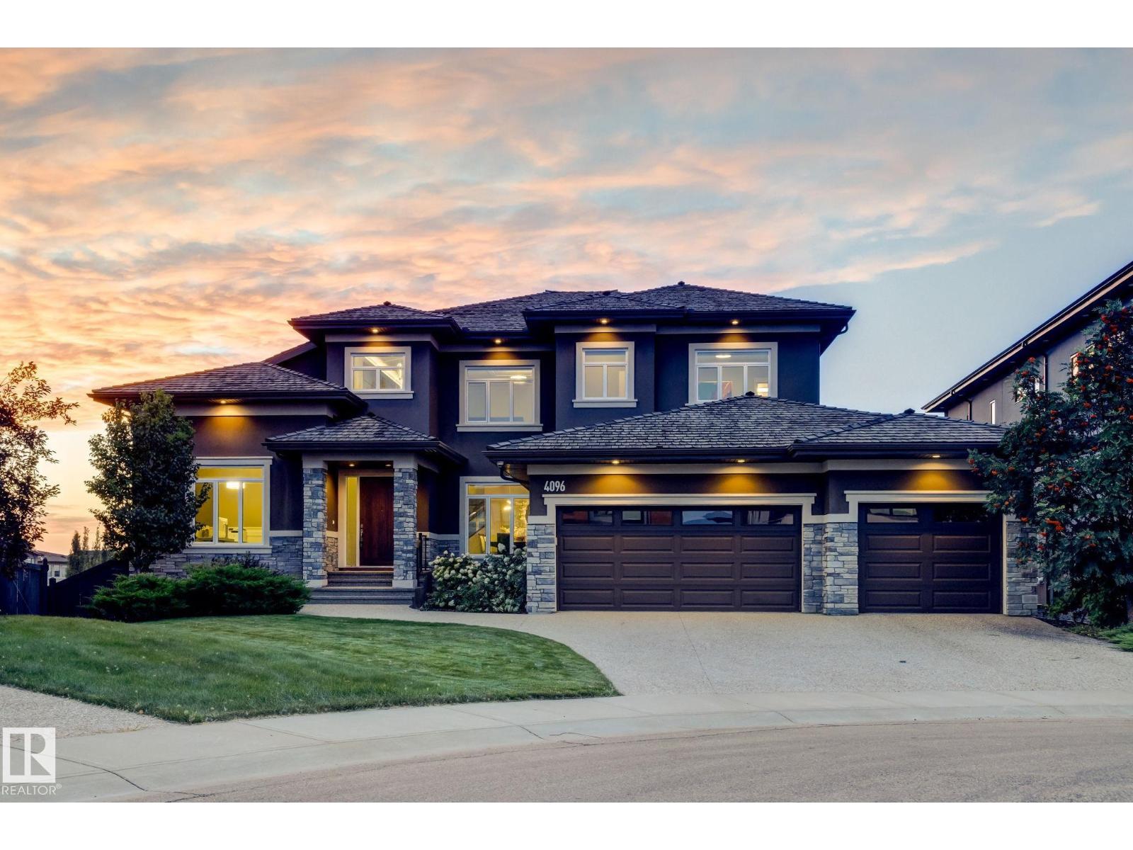 4096 WHISPERING RIVER DR NW