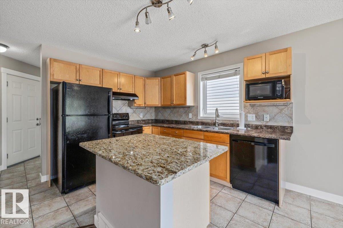 #69 1428 HODGSON WY NW