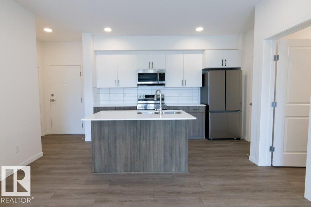 #206 9211 228 ST NW