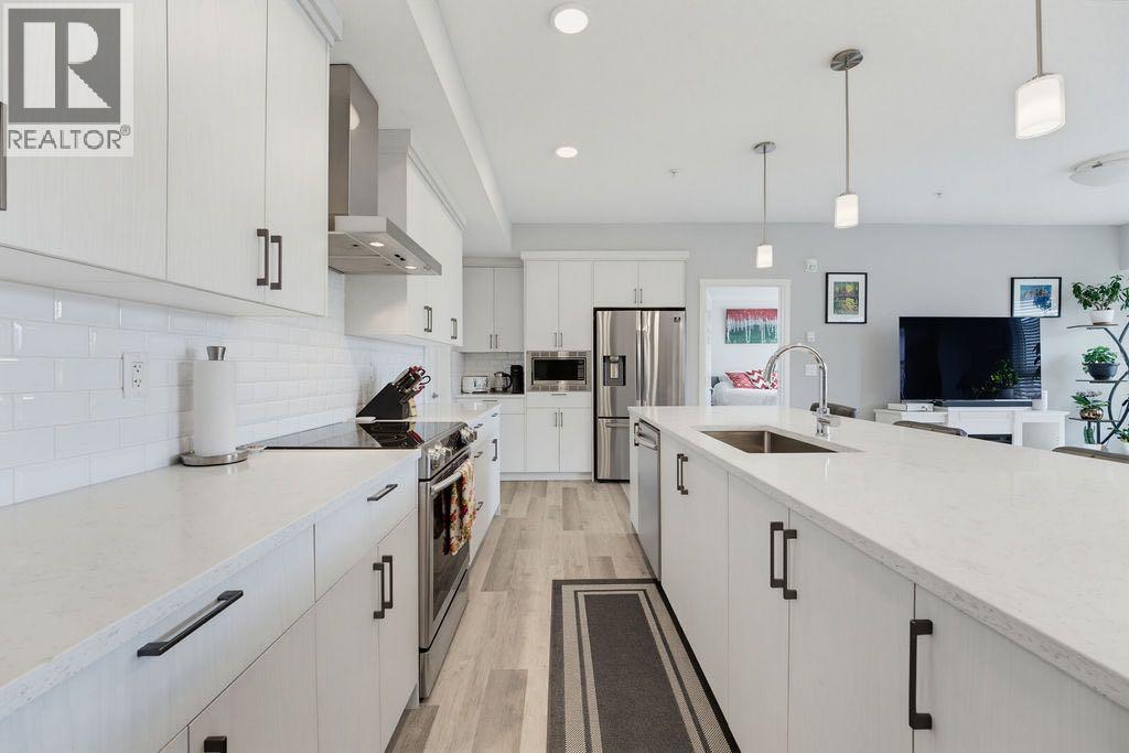 204, 300 Harvest Hills Place NE