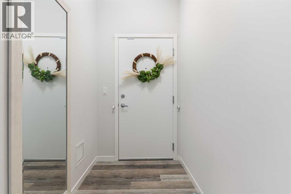 402, 300 Harvest Hills Place NE