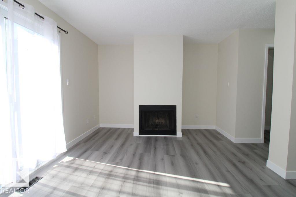 #207 14707 53 AV NW