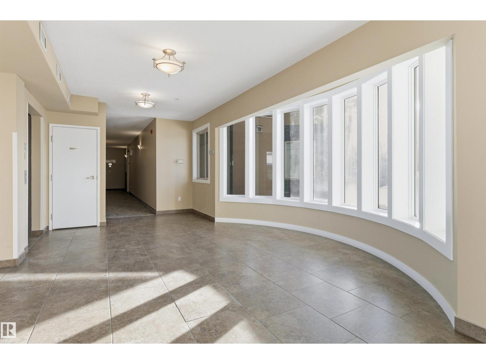 #210 8730 82 AV NW