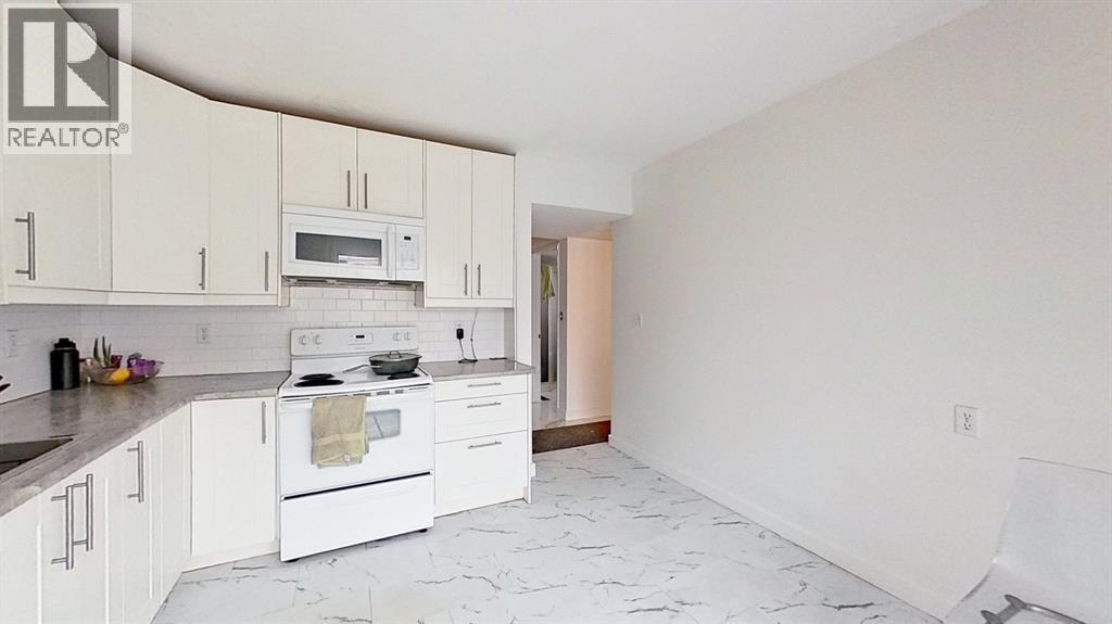 101, 1305 Glenmore Trail