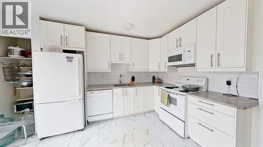 101, 1305 Glenmore Trail