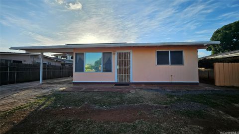 Photo of 91-1046 Kaunolu Street, Ewa Beach, HI 96706 (MLS # 202609582)
