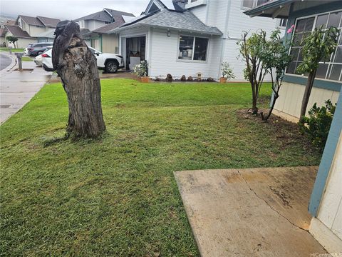 Photo of 91-1127 Kumulipo Street, Kapolei, HI 96707 (MLS # 202605838)