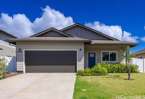 Photo of 91-1414 Kapeku Street, Ewa Beach, HI 96706 (MLS # 202609459)