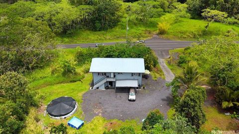 Photo of 13-1368 Launahele Road, Pahoa, HI 96778 (MLS # 202426197) Photo of 13-1368 Launahele Road, Pahoa, HI 96778 (MLS # 202426197)