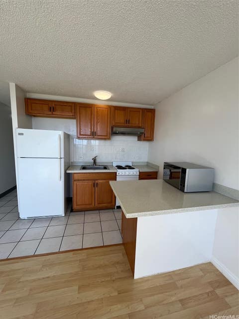 Photo of 3045 Ala Napuaa Place #614, Honolulu, HI 96818 (MLS # 202616062)