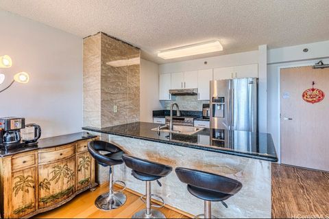 Photo of 3009 Ala Makahala Place #1505, Honolulu, HI 96818 (MLS # 202607002)