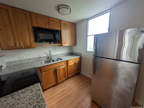 Photo of 46-270 Kahuhipa Street #A619, Kaneohe, HI 96744 (MLS # 202516342)