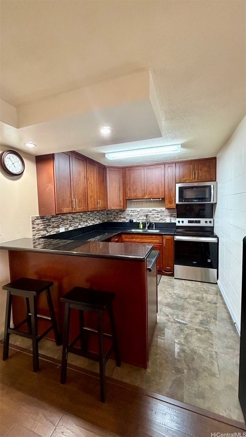 Photo of 94-99 Waipahu Street #A308, Waipahu, HI 96797 (MLS # 202524583)