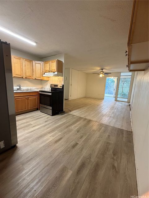 Photo of 95-2048 Waikalani Place #D106, Mililani, HI 96789 (MLS # 202607113)