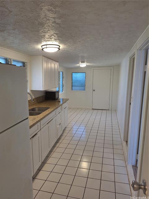 Photo of 1322 Olino Street #C, Honolulu, HI 96818 (MLS # 202615867)