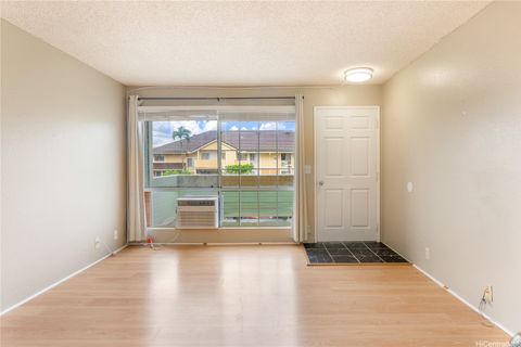 Photo of 94-1457 Waipio Uka Street #O203, Waipahu, HI 96797 (MLS # 202528097)