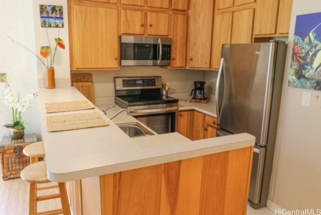 75-6016 Alii Drive 108