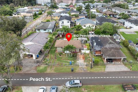 Photo of 910 Peach Street, Wahiawa, HI 96786 (MLS # 202606945)