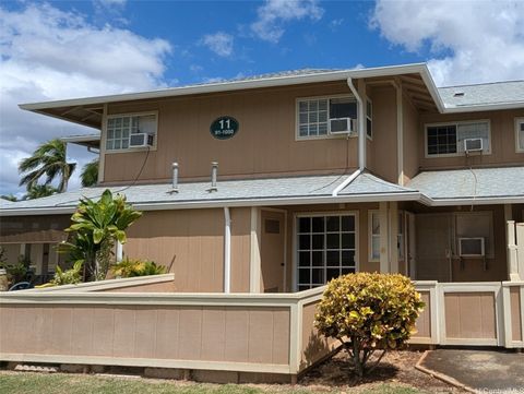 Photo of 91-1050 Makaaloa Street #11C, Ewa Beach, HI 96706 (MLS # 202525386)