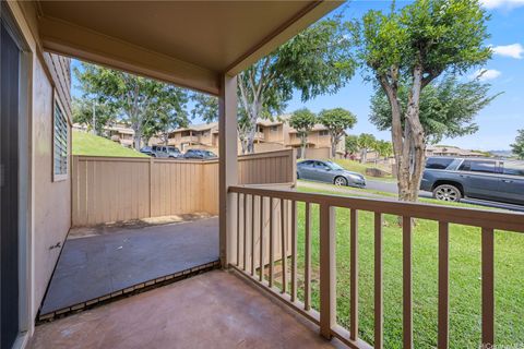 Photo of 98-1372 Koaheahe Place #18168, Pearl City, HI 96782 (MLS # 202606818)