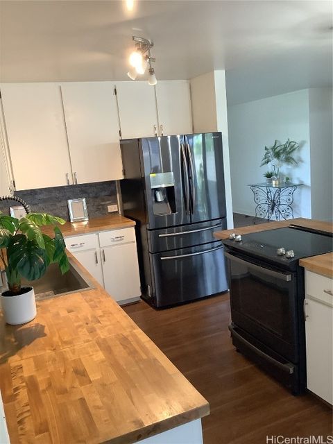 Photo of 91-615 Onelua Street, Ewa Beach, HI 96706 (MLS # 202427534)
