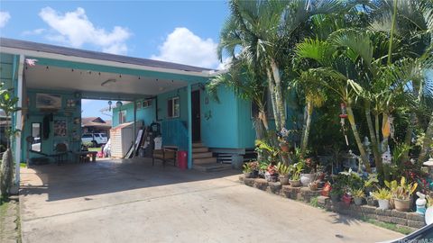 Photo of 91-1855 Park Row, Ewa Beach, HI 96706 (MLS # 202614254)