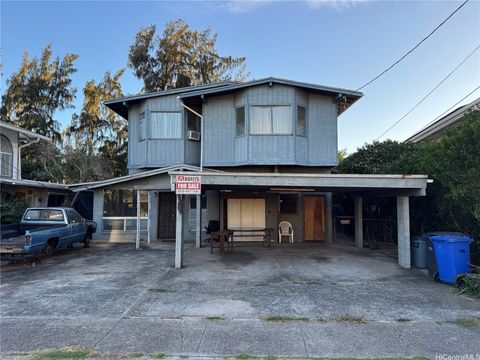Photo of 99-49 Ohiaku Street, Aiea, HI 96701 (MLS # 202526348)